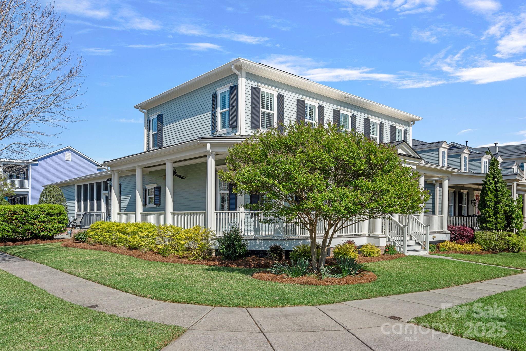 9803 Tree Canopy Road Charlotte, NC 28277 - Photo 33 of 42 a front view of a house with a yard