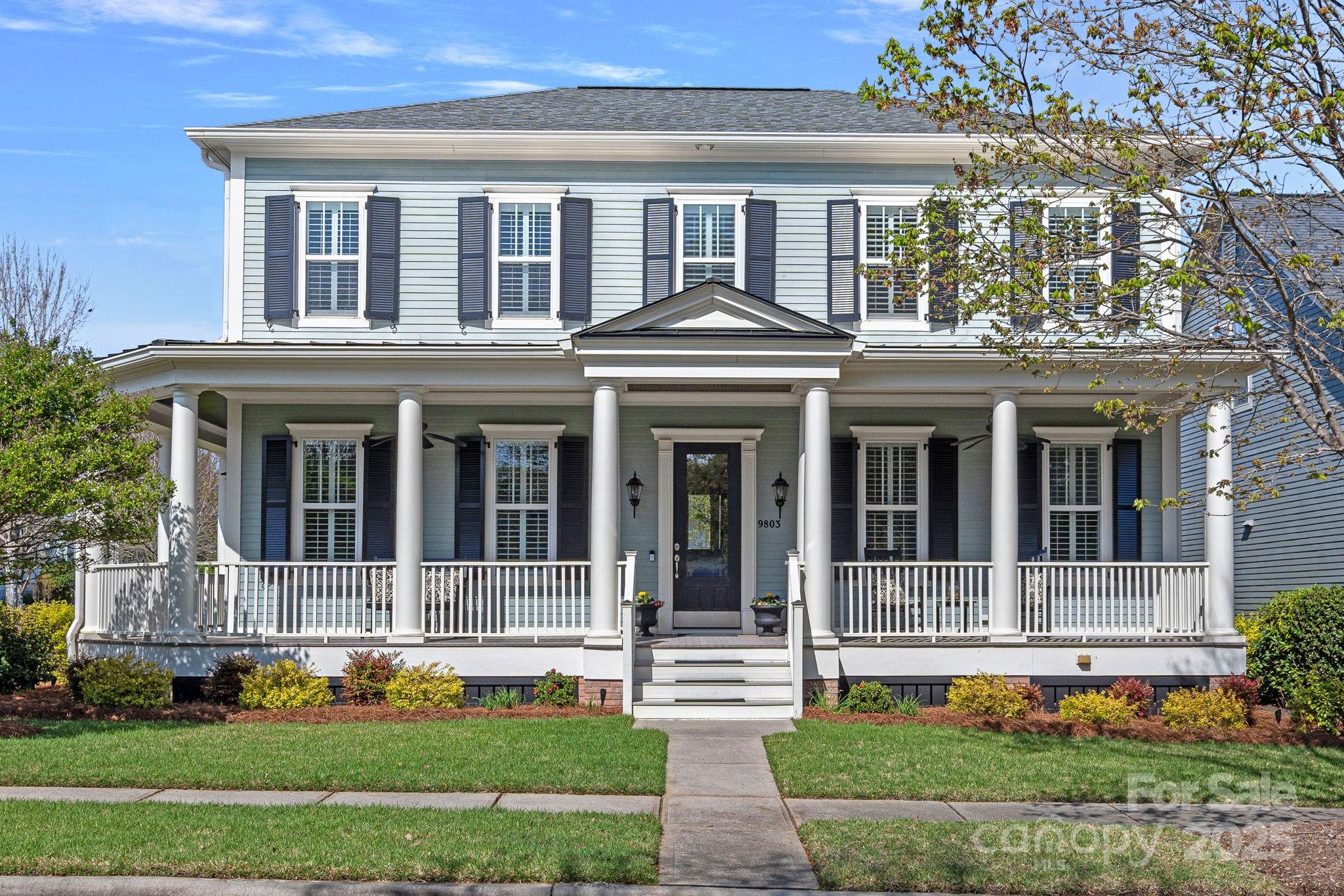 9803 Tree Canopy Road Charlotte, NC 28277 - Photo 35 of 42 front view of a house with a yard