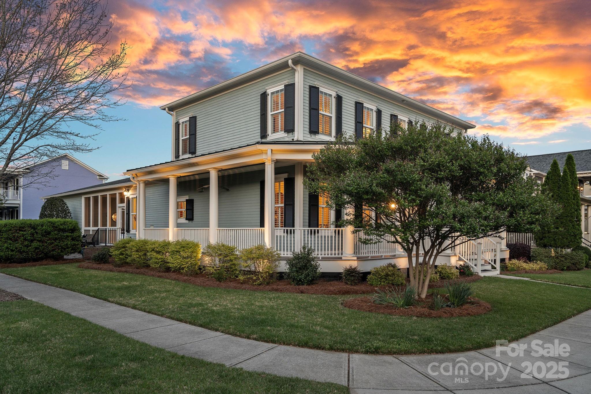 9803 Tree Canopy Road Charlotte, NC 28277 - Photo 38 of 42 a front view of a house with a garden