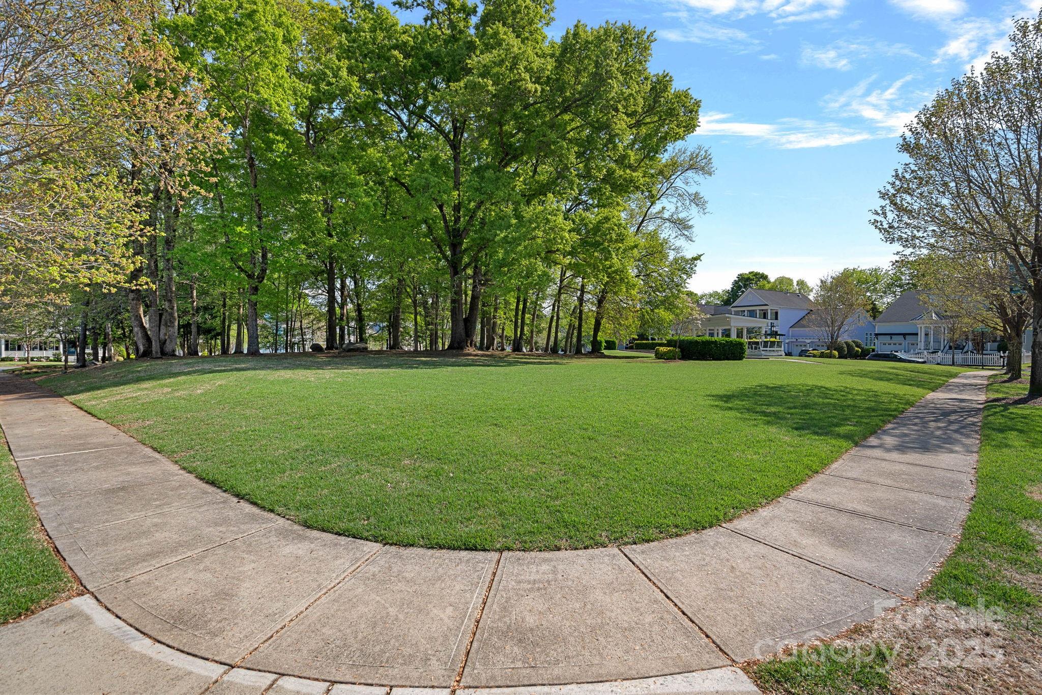 9803 Tree Canopy Road Charlotte, NC 28277 - Photo 39 of 42 a view of a garden with trees