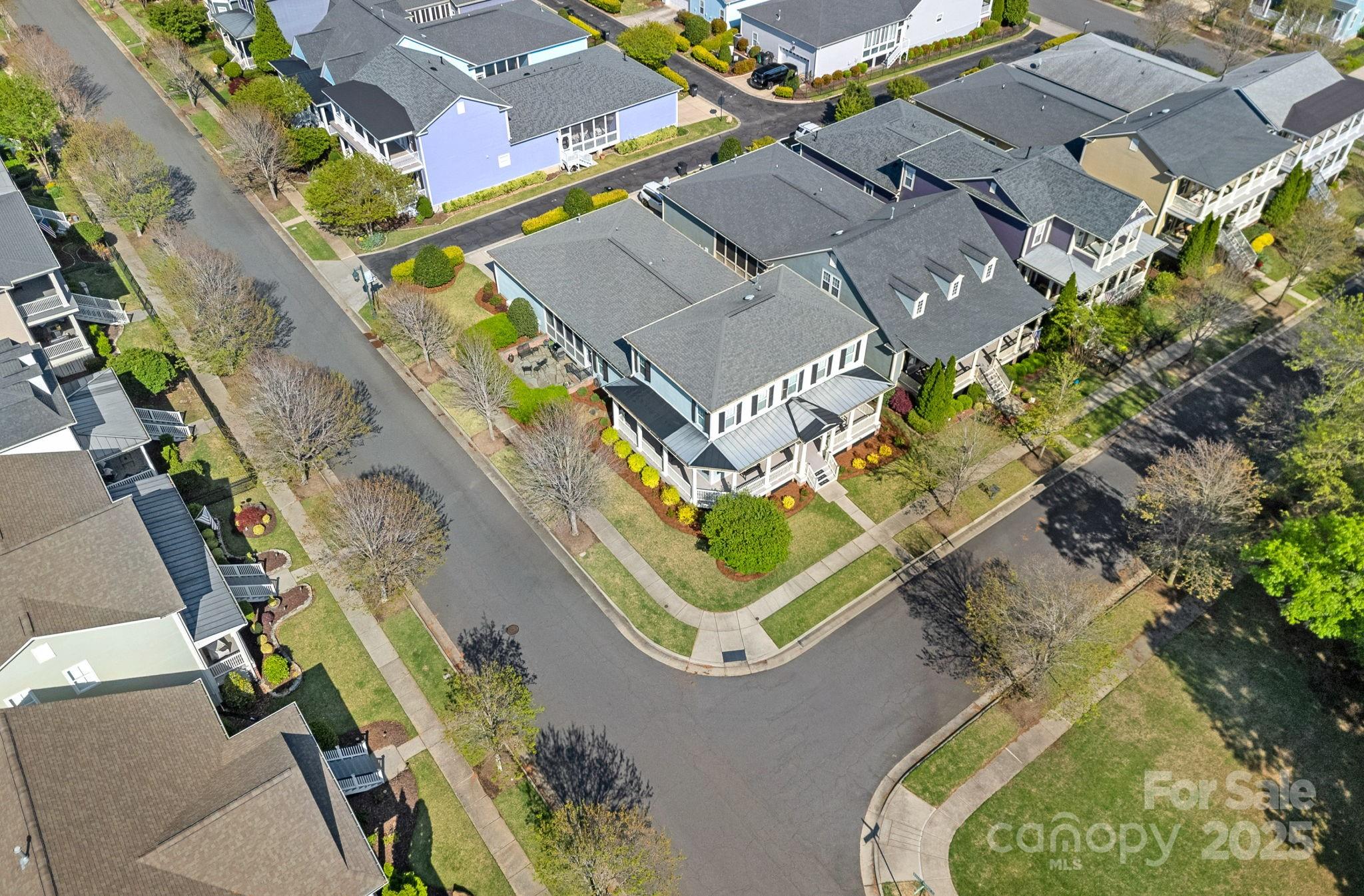 9803 Tree Canopy Road Charlotte, NC 28277 - Photo 40 of 42 an aerial view of a house with a swimming pool