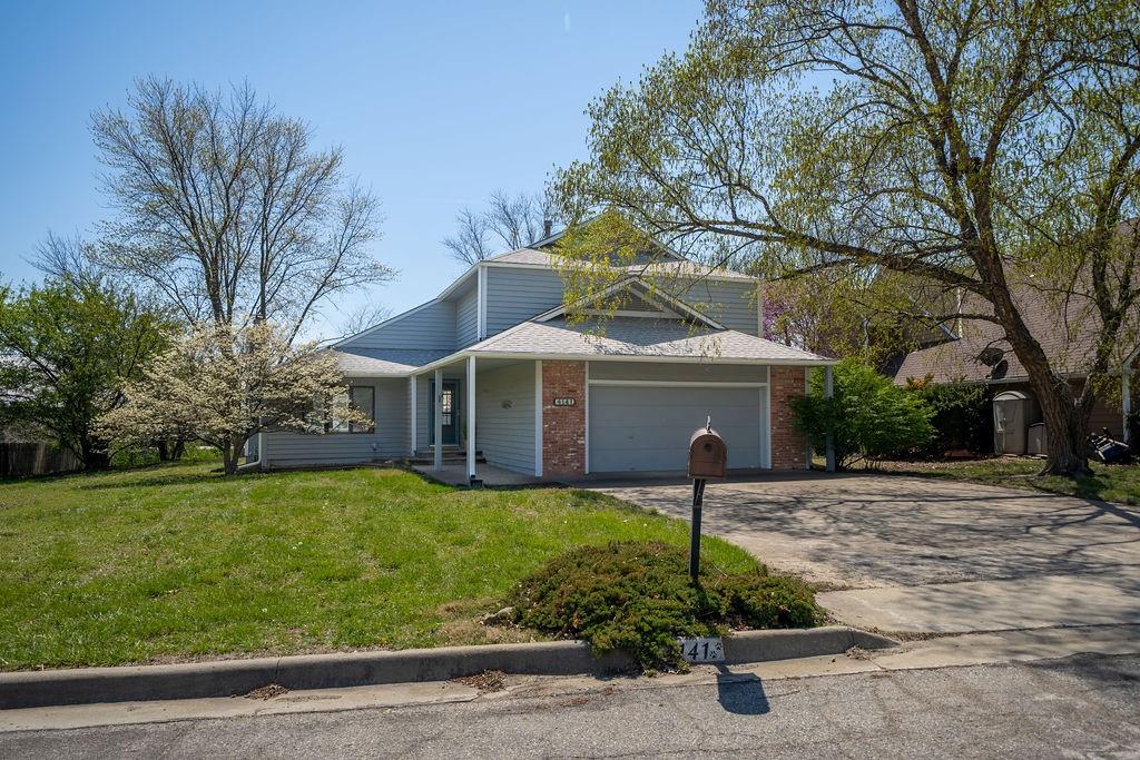 4141 Wimbledon Circle Lawrence, KS 66047 - Photo 3 of 65