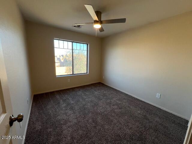 19289 North Leland Road Maricopa, AZ 85138 - Photo 6 of 11 an empty room with a window