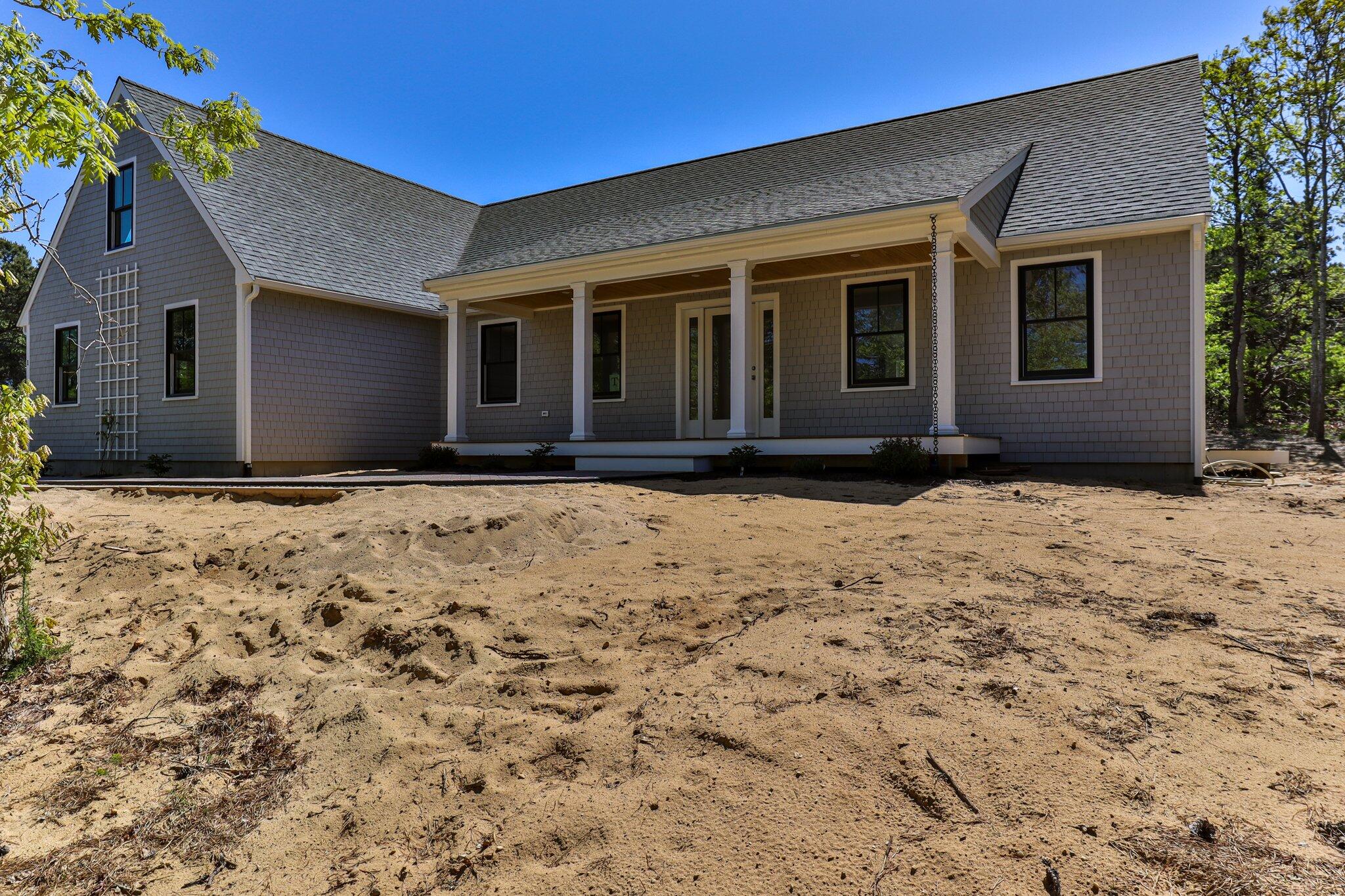 1 Lily Lane Truro, MA 02666 - Photo 1 of 45 a view of house with yard