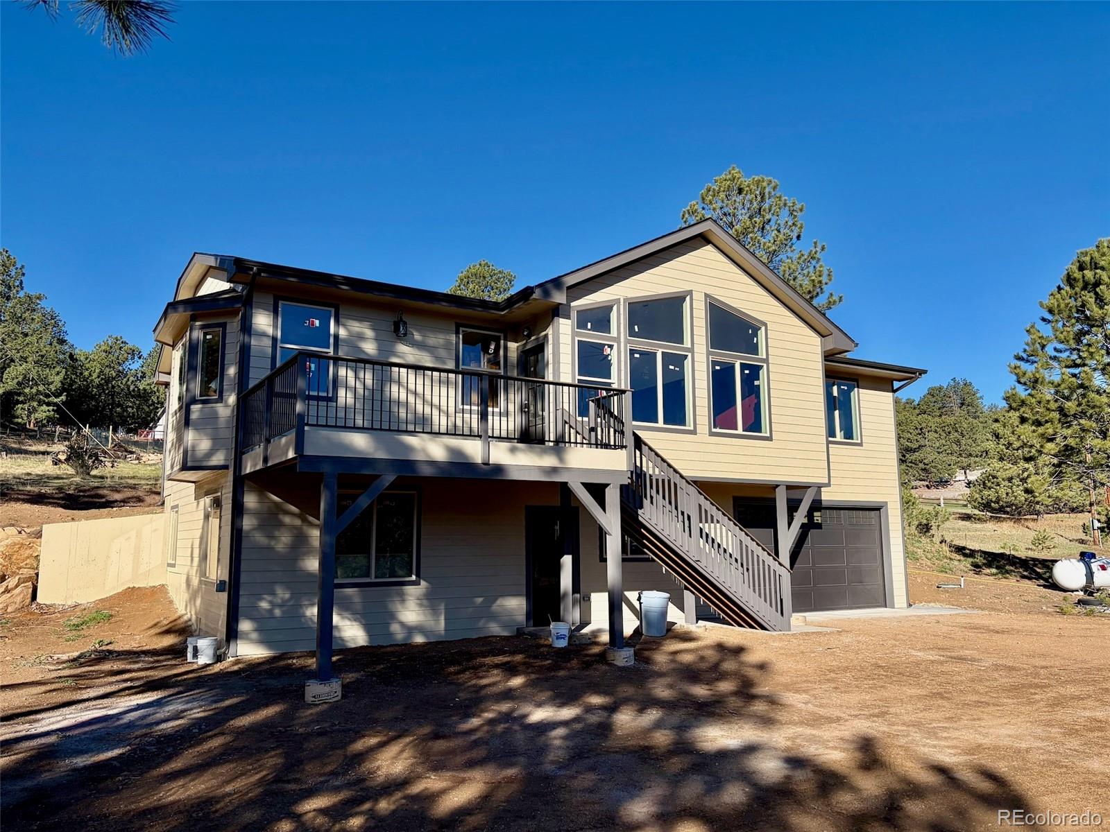 174 Chickadee Lane Bailey, CO 80421 - Photo 19 of 39 a view of a house with a balcony