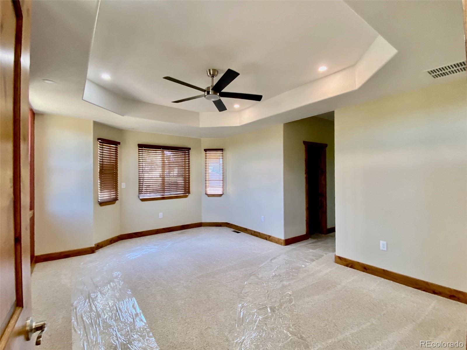 174 Chickadee Lane Bailey, CO 80421 - Photo 6 of 39 a view of an empty room with a window