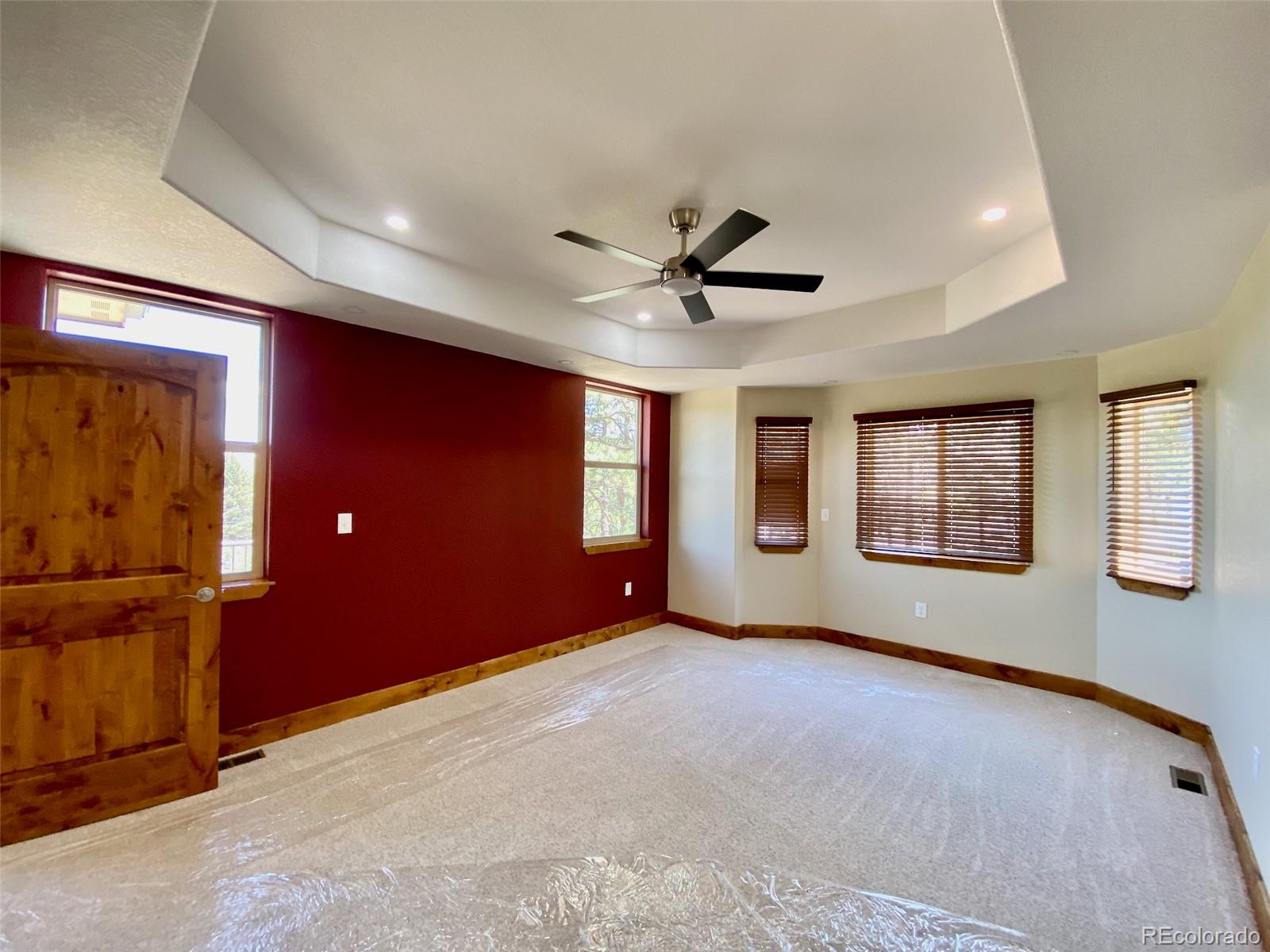 174 Chickadee Lane Bailey, CO 80421 - Photo 7 of 39 a view of an empty room with window
