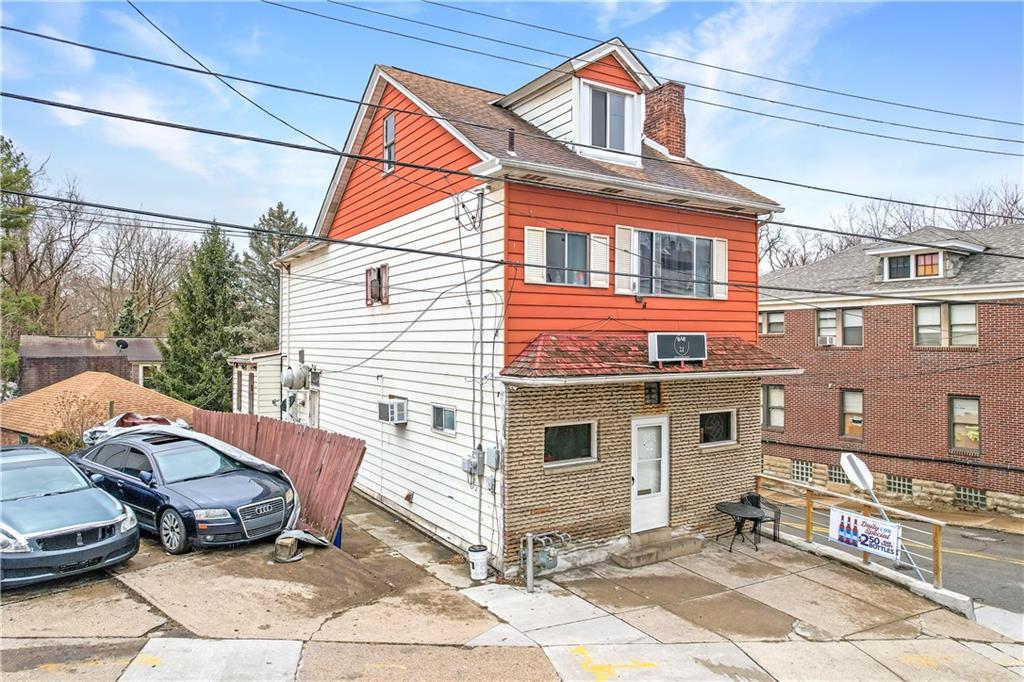 2100 Spring Street Pittsburgh, PA 15210 - Photo 13 of 14 a backyard of a house with outdoor seating