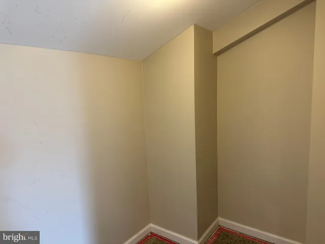 a bathroom with a shower and a sink