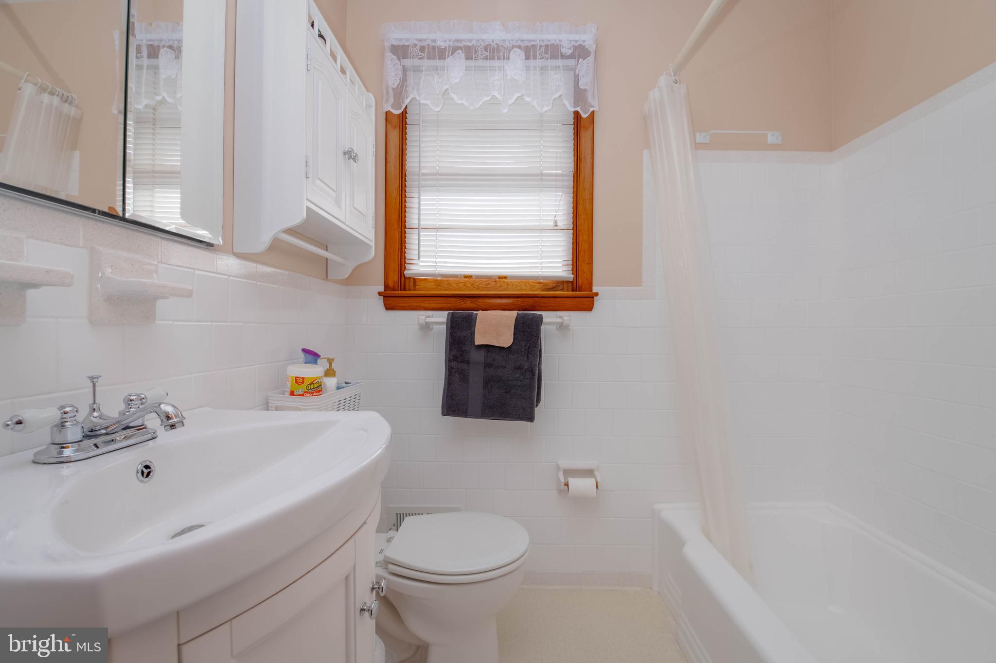 2319 Reckord Road Joppa, MD 21085 - Photo 25 of 45 a bathroom with a sink a toilet and bathtub