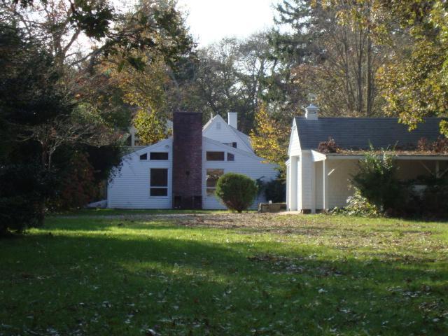 128 Old Stage Road Centerville, MA 02632 - Photo 13 of 17 a view of a house with a yard