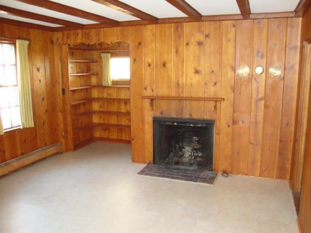 128 Old Stage Road Centerville, MA 02632 - Photo 4 of 17 a room with a fireplace