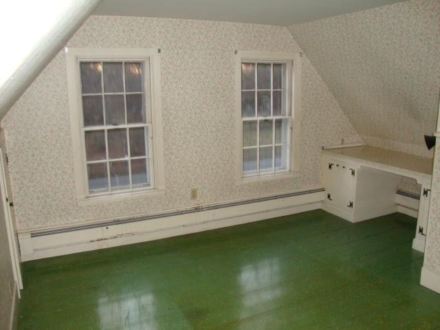 128 Old Stage Road Centerville, MA 02632 - Photo 10 of 17 an empty room with a window