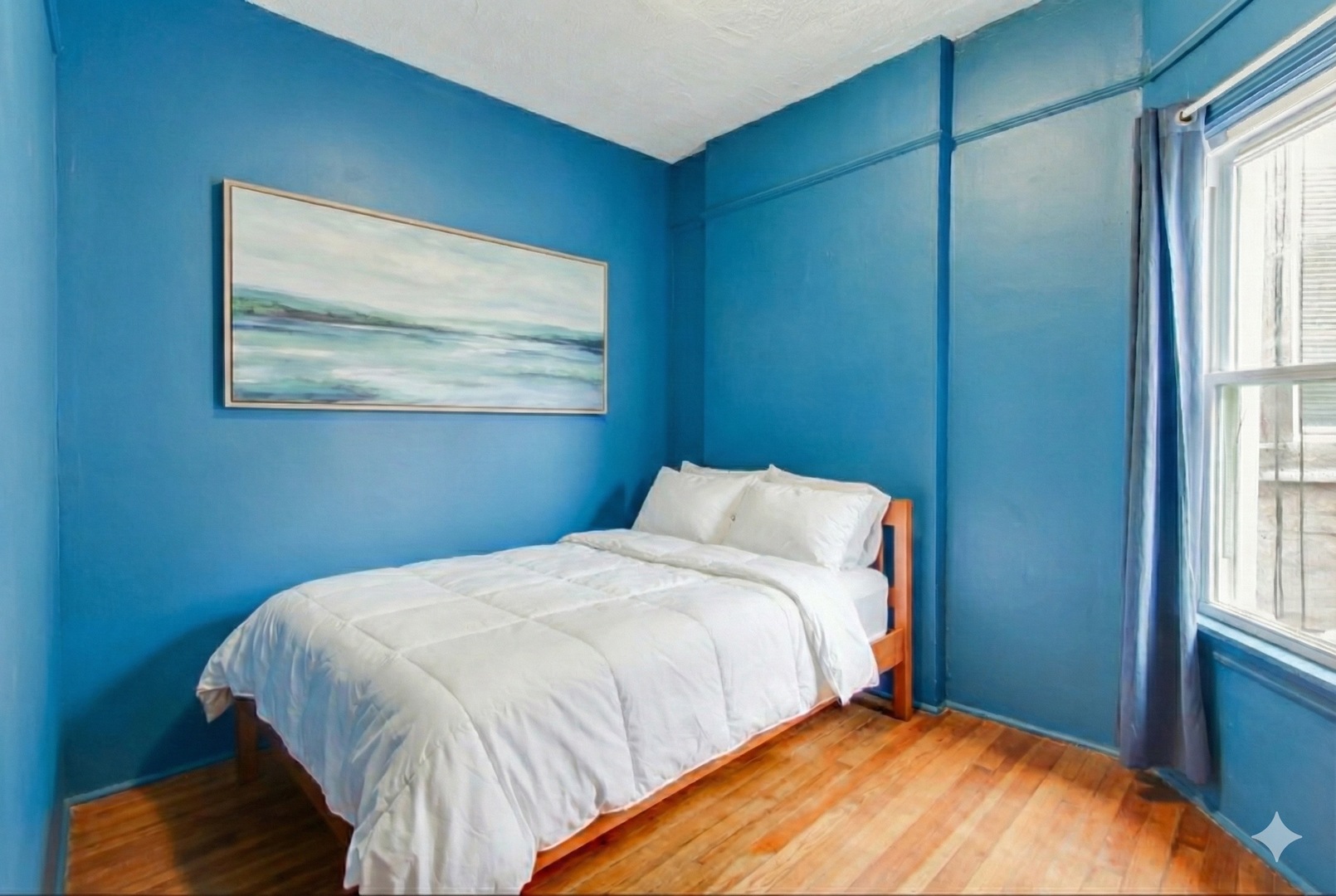 4049 South Indiana Avenue Chicago, IL 60653 - Photo 16 of 23 a bedroom with a bed and window