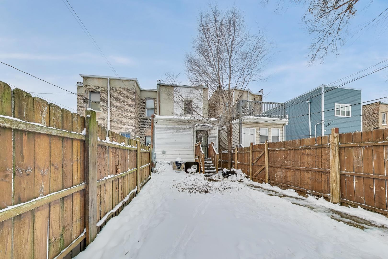 4049 South Indiana Avenue Chicago, IL 60653 - Photo 20 of 23 a view of a building with a street