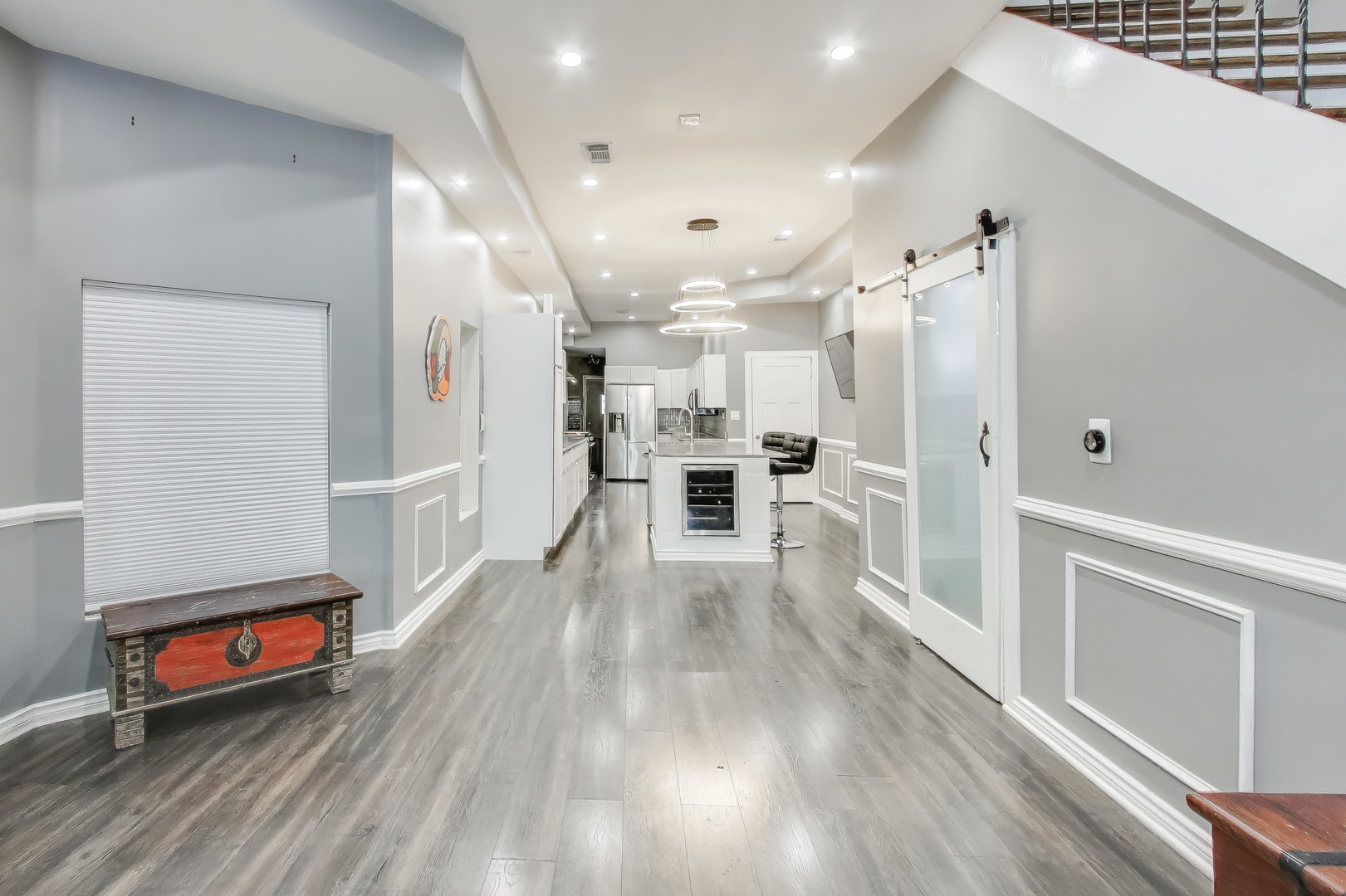4049 South Indiana Avenue Chicago, IL 60653 - Photo 6 of 23 a view of a hallway with wooden floor