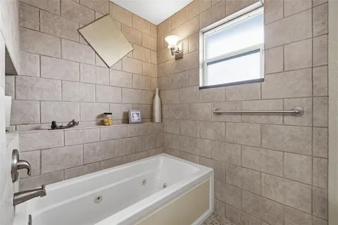 a bathroom with a bathtub
