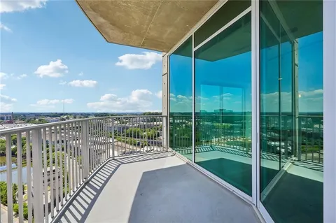 a balcony with a water view
