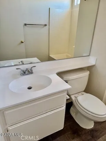 a bathroom with a sink and a toilet