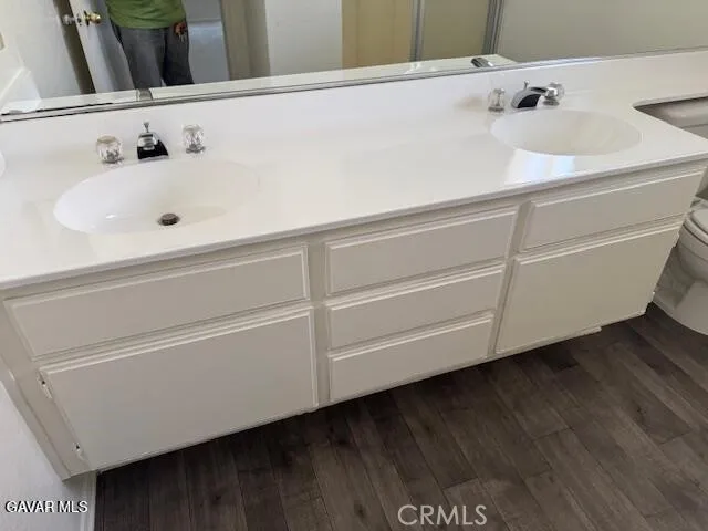 a bathroom with a sink and mirror