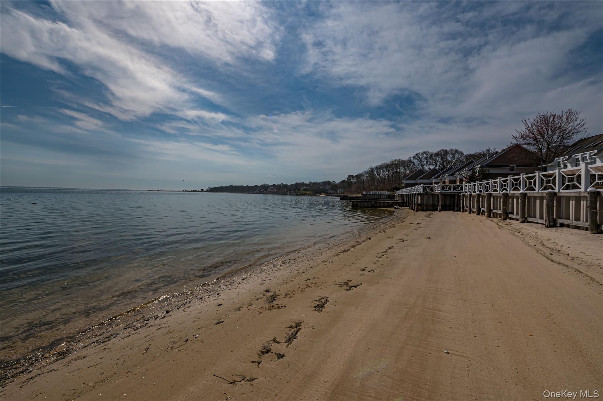 49 Canoe Place Road, Unit 212 Hampton Bays, NY 11946 - Photo 21 of 22 a view of outdoor space with ocean view