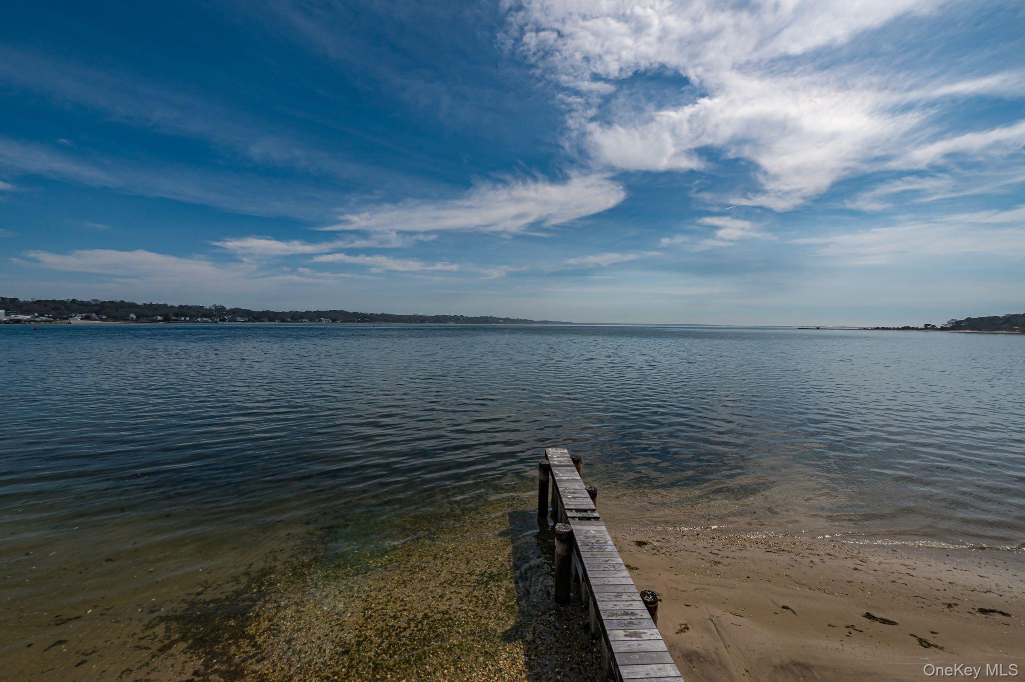 49 Canoe Place Road, Unit 212 Hampton Bays, NY 11946 - Photo 22 of 22 a view of a lake view