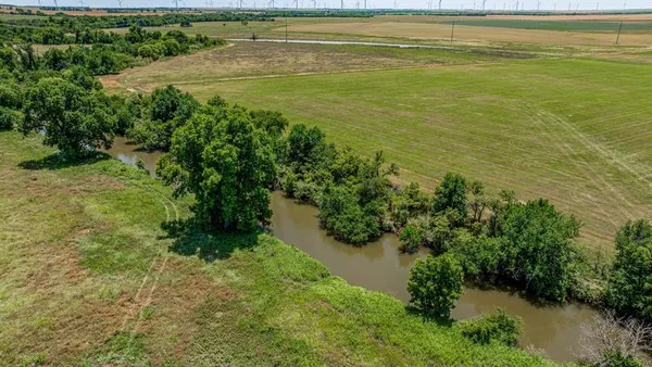 a view of a lake with outdoor space