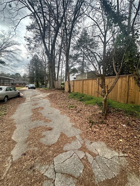 1220 Westmont Road Southwest Atlanta, GA 30310 - Photo 5 of 5 a backyard of a house with lots of green space