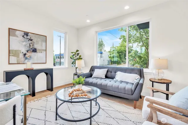 a bedroom with a bed and a lamp