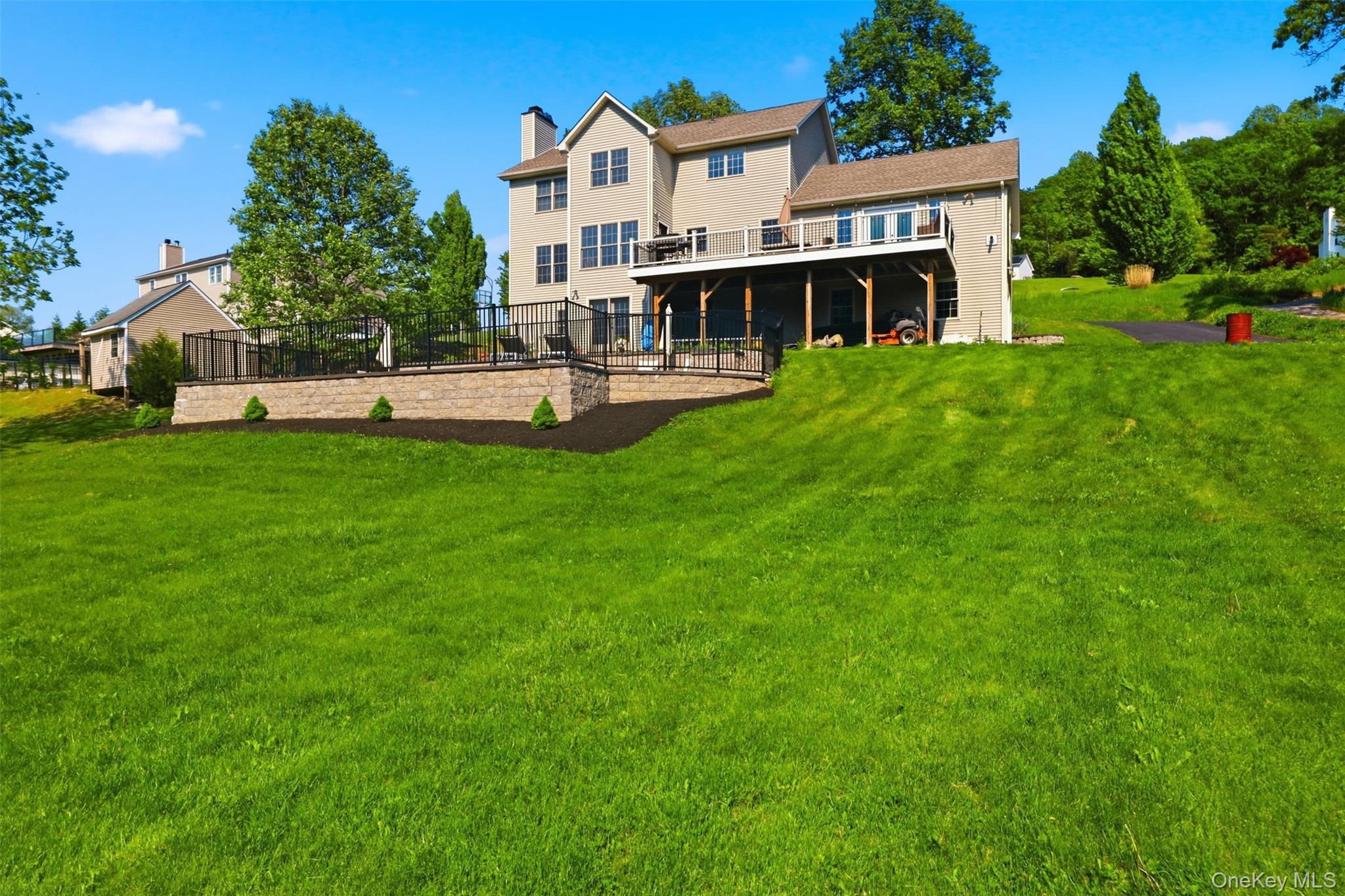 233 Devon Farms Road Stormville, NY 12582 - Photo 42 of 48 a view of a house with a big yard