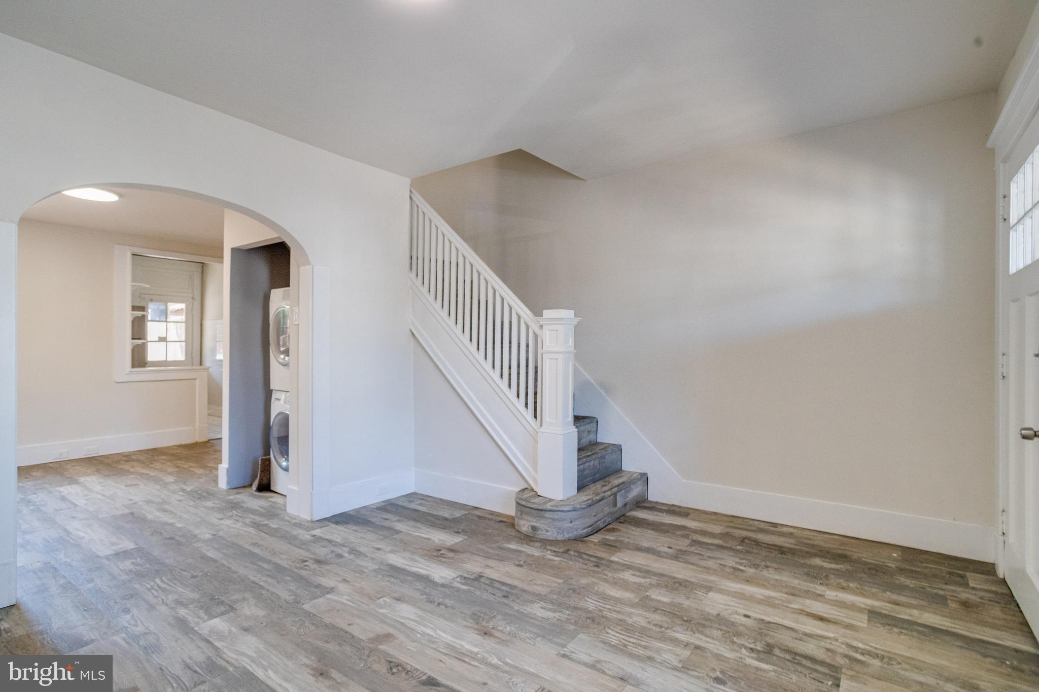 5878 Belair Road Baltimore, MD 21206 - Photo 6 of 41 a view of entryway and hall with wooden floor