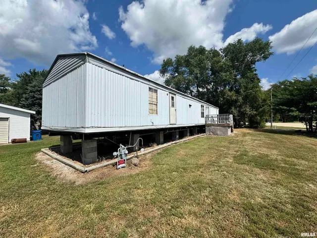 a view of a back yard of the house