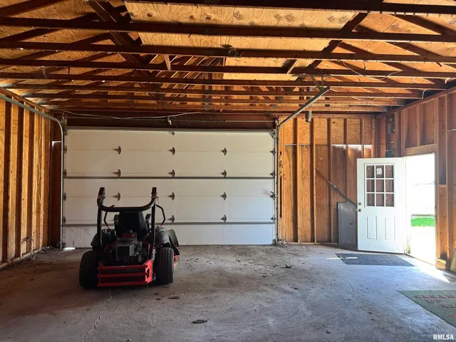 a view of a garage with storage
