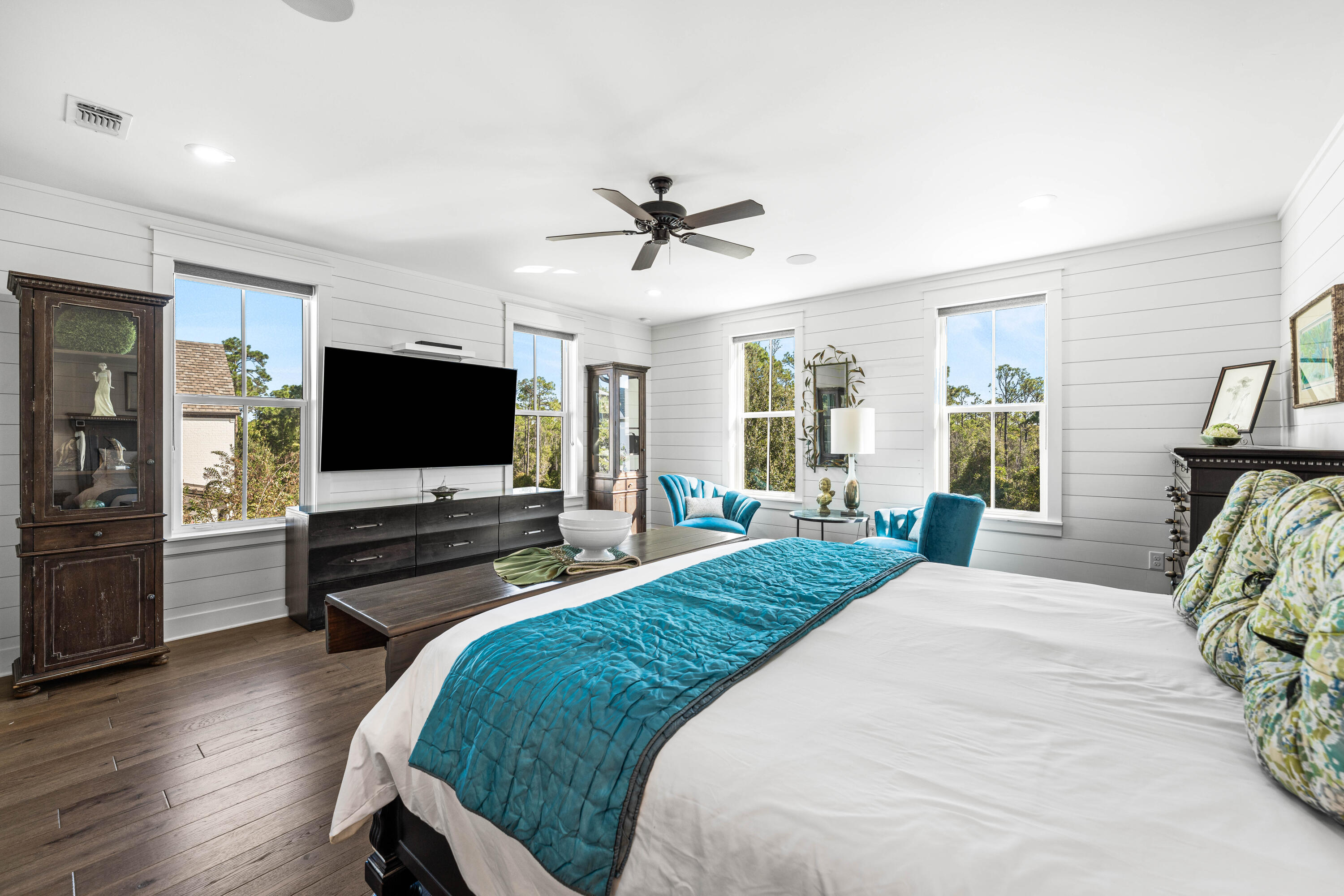 38 Ridgewalk Circle Santa Rosa Beach, FL 32459 - Photo 17 of 28 a spacious bedroom with a bed and a flat screen tv on dresser