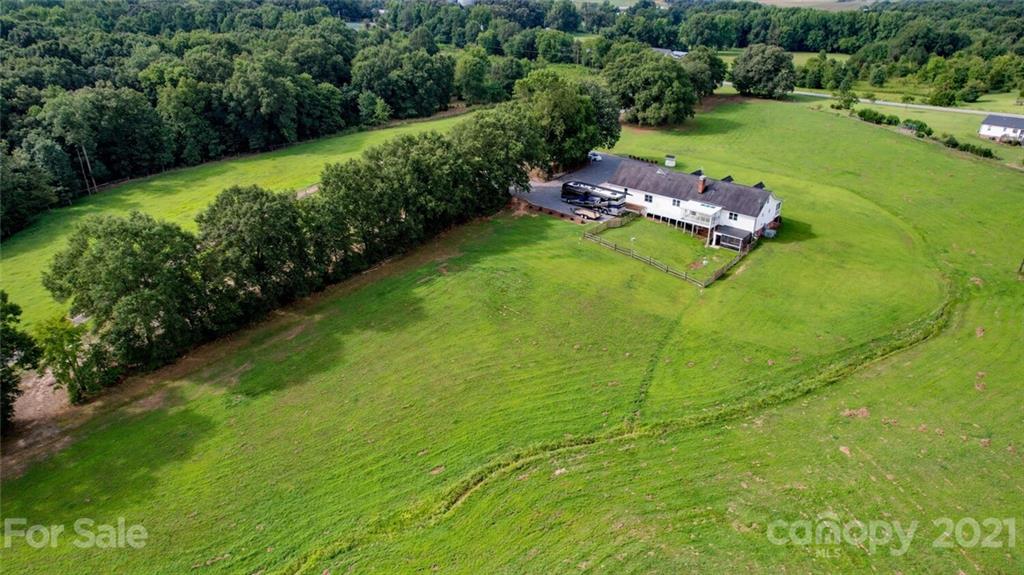 6460 Talley Road Stanfield, NC 28163 - Photo 2 of 47 a view of an outdoor space and yard