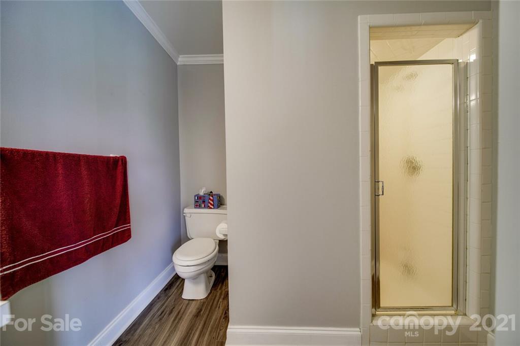 6460 Talley Road Stanfield, NC 28163 - Photo 13 of 47 a bathroom with a toilet and a shower