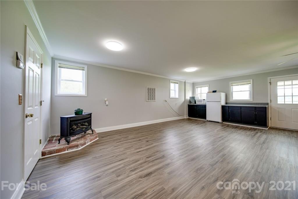 6460 Talley Road Stanfield, NC 28163 - Photo 16 of 47 a view of livingroom with furniture and wooden floor