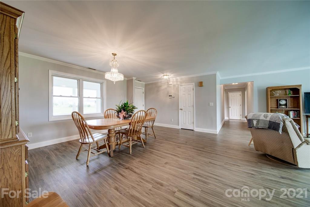 6460 Talley Road Stanfield, NC 28163 - Photo 25 of 47 a view of a dining room with furniture and window