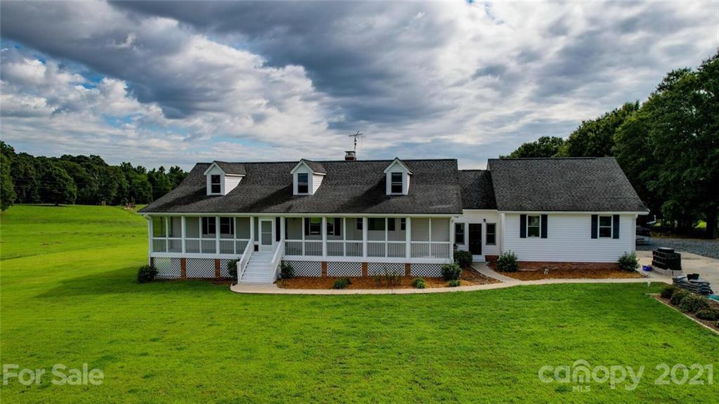 6460 Talley Road Stanfield, NC 28163 - Photo 4 of 47 front view of a house with a yard