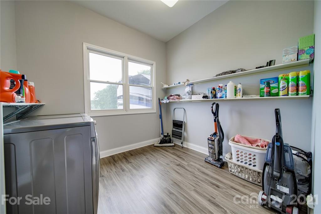 6460 Talley Road Stanfield, NC 28163 - Photo 36 of 47 a view of a workspace with furniture and a window