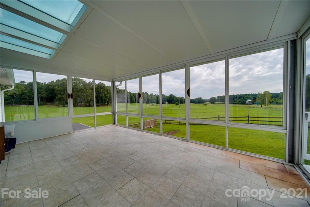 6460 Talley Road Stanfield, NC 28163 - Photo 39 of 47 a view of an empty room with a large windows