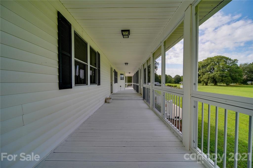 6460 Talley Road Stanfield, NC 28163 - Photo 43 of 47 a view of a porch