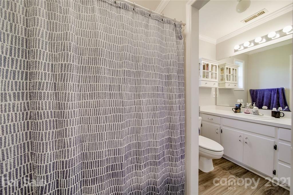 6460 Talley Road Stanfield, NC 28163 - Photo 10 of 47 a bathroom with a sink a toilet and a mirror