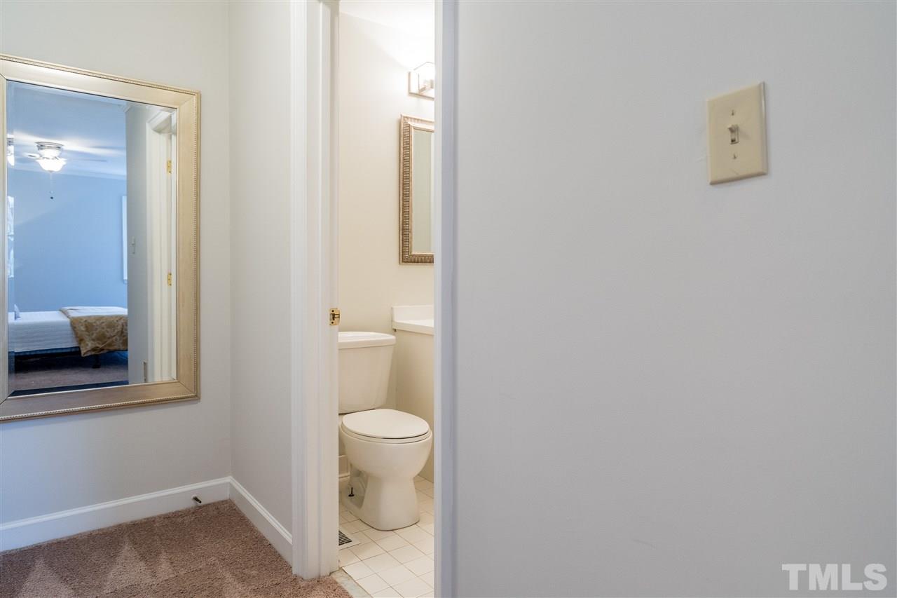 7010 Sandy Forks Road, Unit 207 Raleigh, NC 27615 - Photo 22 of 27 a bathroom with a toilet