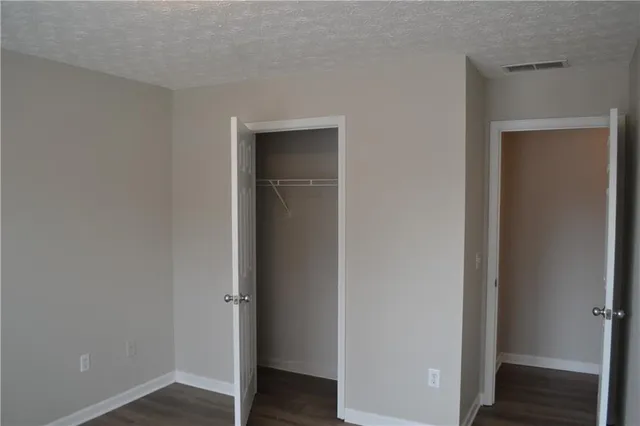 a view of small space with wooden floor