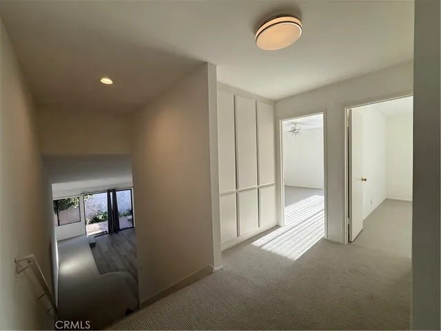 a view of livingroom and hardwood floor