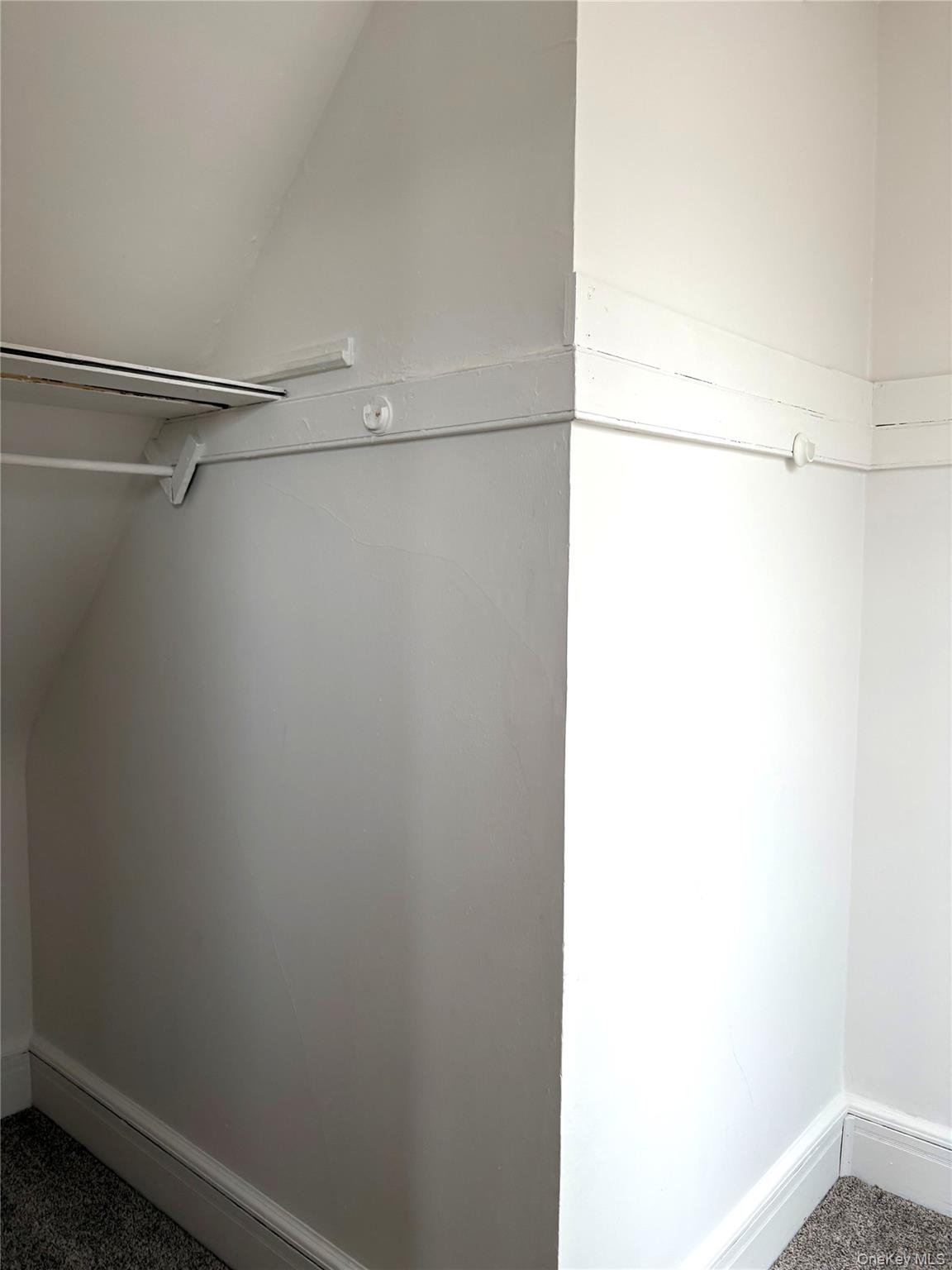 558 Locust Avenue, Unit 2 Port Chester, NY 10573 - Photo 5 of 11 a view of a room with racks on the wall