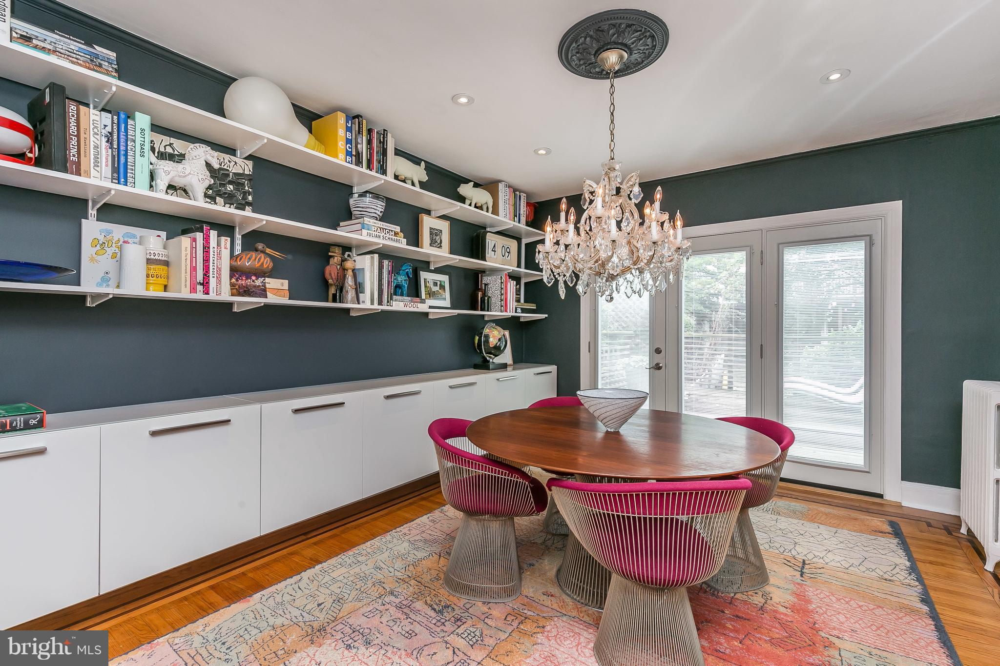 3622 Kimble Road Baltimore, MD 21218 - Photo 11 of 30 a dining room with furniture a rug and a chandelier