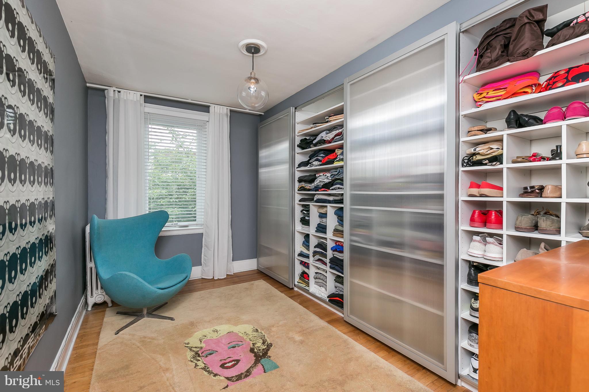3622 Kimble Road Baltimore, MD 21218 - Photo 21 of 30 a view of a livingroom with shelves