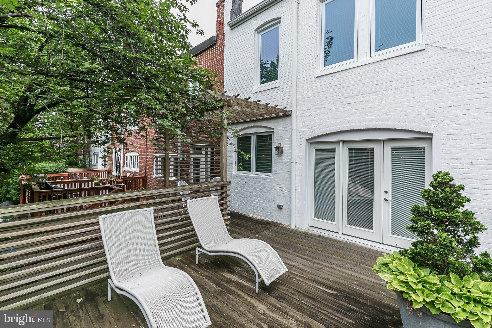 3622 Kimble Road Baltimore, MD 21218 - Photo 24 of 30 a view of a chairs and table in backyard of the house